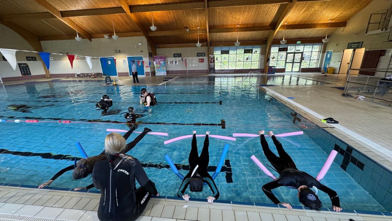 Coached finning practice